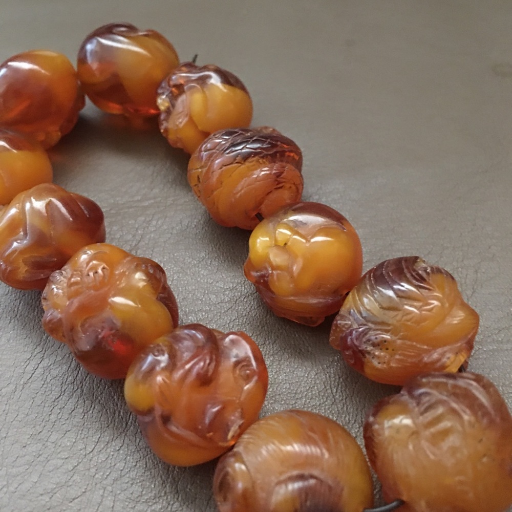 Authentic Orange Amber. Hand Carved .